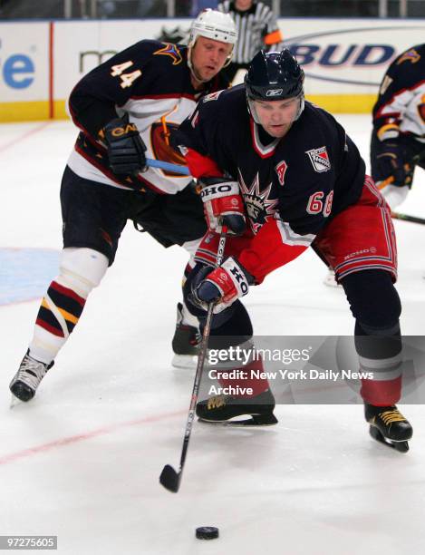 New York Rangers' Jaromir Jagr controls the puck during the third period of a game against the Atlanta Thrashers at Madison Square Garden. The...