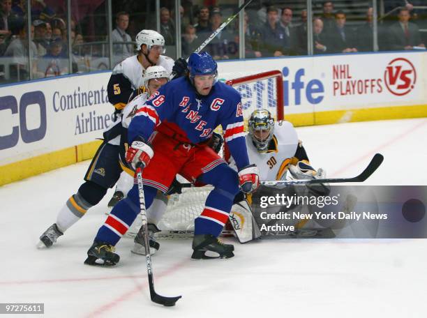 New York Rangers' Jaromir Jagr controls the puck in front of the Buffalo Sabres' net in the third period of their Eastern Conference semifinal...