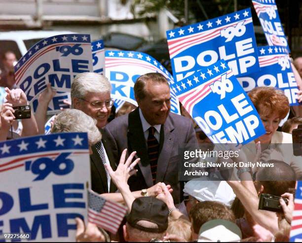Jack Kemp and Bob Dole are greeted by supporters Sunday on their arrival at Embarcadero Marina Park behind the San Diego Convention Center. The...