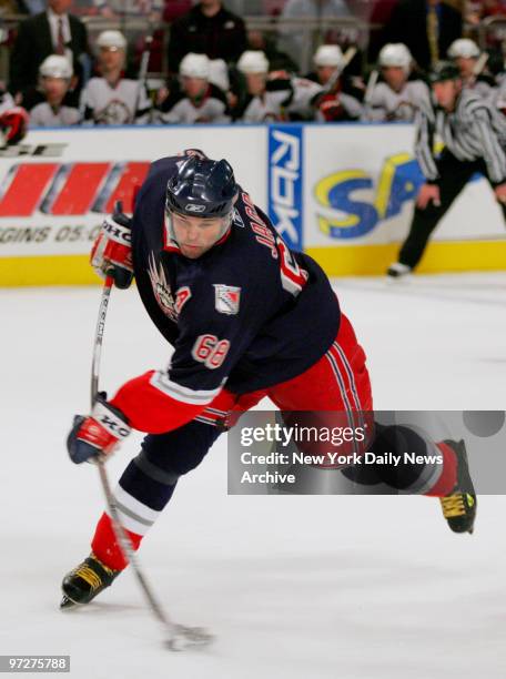 New York Rangers' Jaromir Jagr takes a shot on goal in the final seconds of the third period against the Buffalo Sabres at Madison Square Garden....