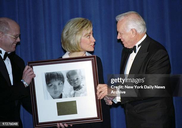 First Lady Hillary Rodham Clinton greets Hugh Downs at the U.S. Committee for Unicef 50th Anniversary Gala at the Sheraton Hotel. Downs, chairman of...