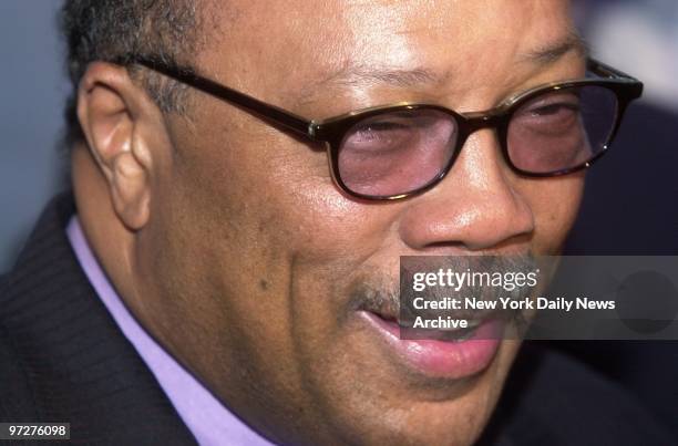 Multitalented music legend Quincy Jones smiles as nominations for the 44th annual Grammy Awards are announced during a news conference at Harlem's...