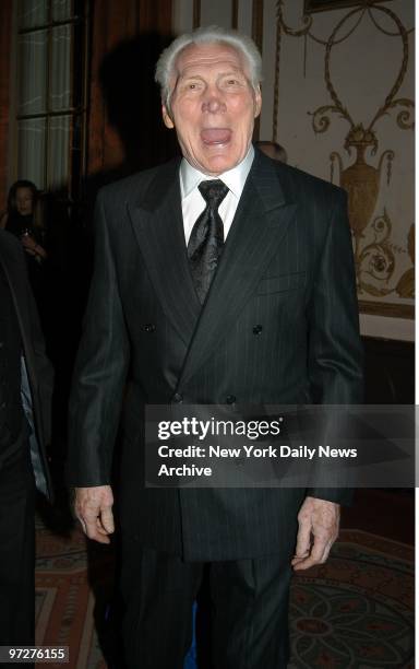 Jack Palance barks back at photographers, who were shouting at him to look their way, while at the Waldorf-Astoria hotel where Billy Crystal was...