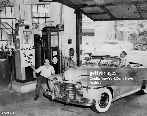 Jack Rawiszer, assistant manager of Dave's Garage, tells customer that gas has gone up to 2 1/2 cents, but he still has no gas to sell due to the...