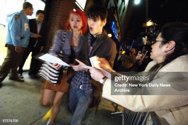 Jackie Aguilar , of Brooklyn, hands out fliers urging the closure of The Falls Bar on Lafayette St. In Manhattan. The bar was the last place...