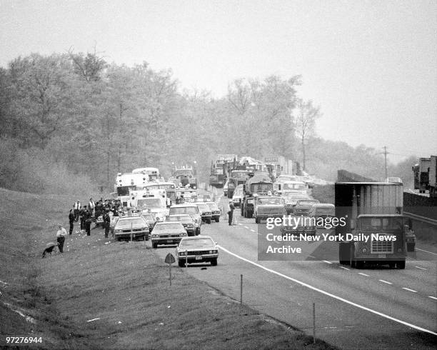 Cops using everthing from the most sophisticated gadgets to old-fashioned canines crowd side of Jersey Turnpike, where Coston died and JoAnne was...