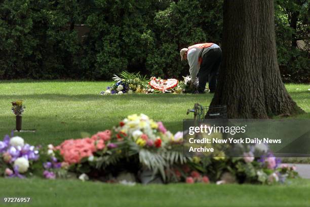 The flower-covered grave of Theresa LaMarca is just yards away from that of her boyfriend, Damien Conners, at Graceland Memorial Cemetery in...