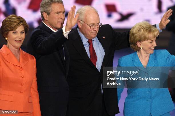 First Lady Laura Bush, President George W. Bush, Vice President Dick Cheney and his wife, Lynne , wave to the crowd after Bush delivered his speech...