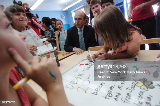 Schools Chancellor Joel Klein wishes school children a good summer on the last day of classes at Public School 58 in Carroll Gardens, Brooklyn.
