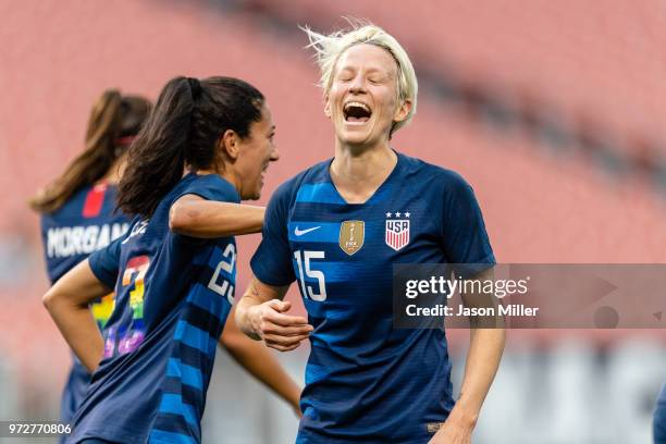 Christen Press celebrates with Megan Rapinoe of the United States after Rapinoe scored during the first half against China at FirstEnergy Stadium on...