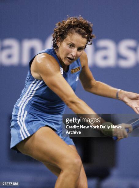 Corina Morariu hits a return to Serena Williams in the first round of the U.S. Open at Arthur Ashe Stadium. Top-seeded Williams coasted to a 6-2,...