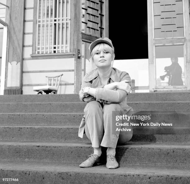 Brigitte Bardot waiting for her car at the Beverly Hills Hotel.