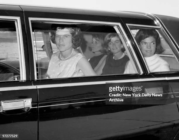 Jacqueline Kennedy leaving Altantic City Airport with her sisters-in-law, Eunice Shriver, Pat Lawford and Jean Smith .