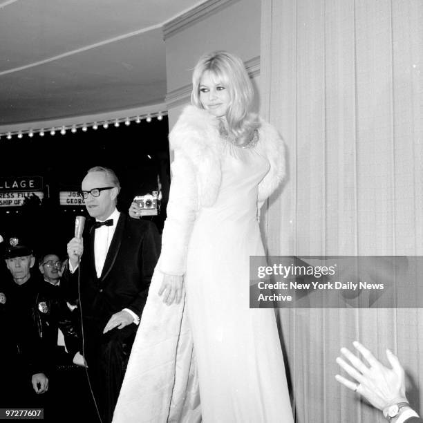 Looking tres chic, Brigitte Bardot attends the Hollywood premiere of her new movie, Viva Maria!