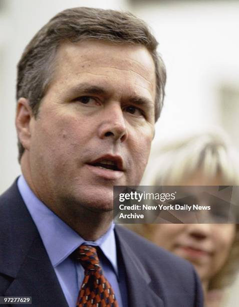 Florida Gov. Jeb Bush speaks to media after he and the President signed an agreement to provide $7.8 billion over 30 years to help restore the...