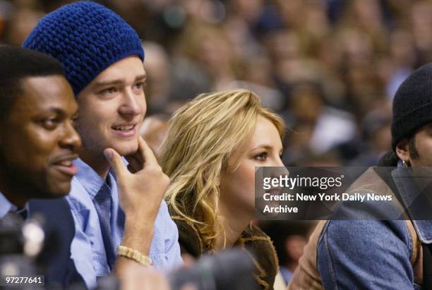 Sync's Justin Timberlake and girlfriend Britney Spears take in first half action at NBA All Star game in Philadelphia.