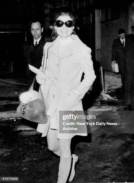 Jacqueline Kennedy Onassis at Kennedy Airport.