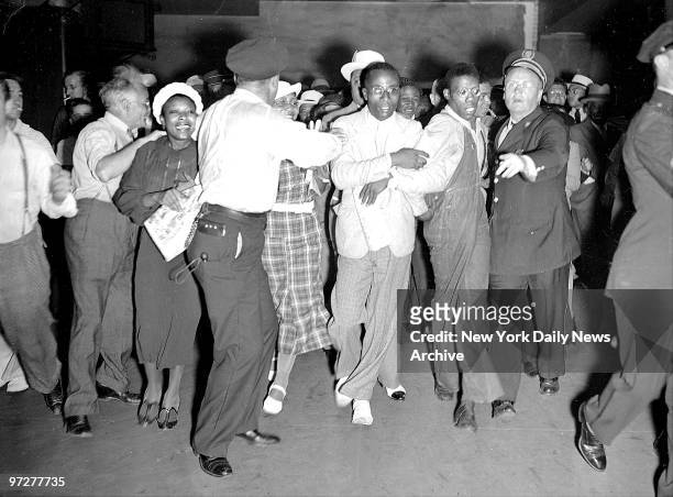 Scottsboro Case - A crowd of 2,000 cheering men and women welcomed the four freed Scottsboro boys as they arrived in Pennsylvania Station. Scores of...