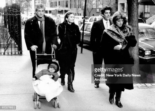 Jacqueline Kennedy Onassis, her son John F. Kennedy Jr., daughter Caroline and Caroline's husband Edwin Schlossberg, pushing their daughter Rose,...