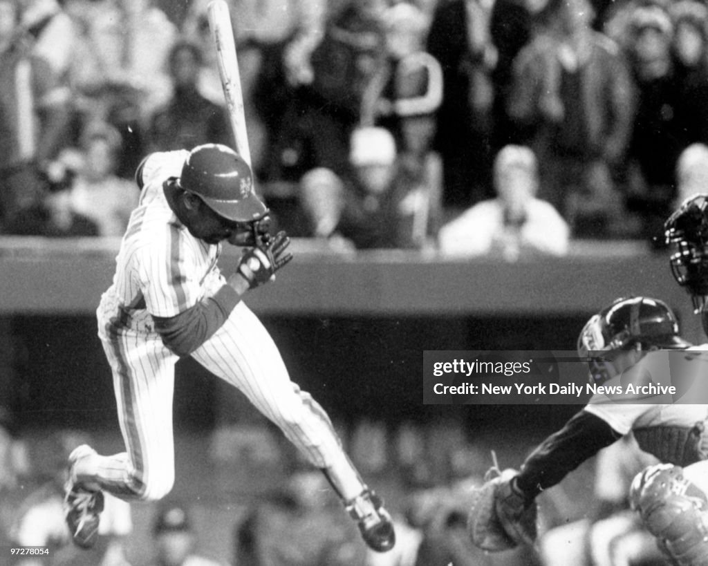 N.Y. Mets Mookie Wilson avoids getting hit by pitch thrown b