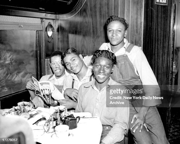 Scottsboro Case - Olen Montgomery, Eugene Williams, Willie Roberson and Roy Wright on train in route to New York.