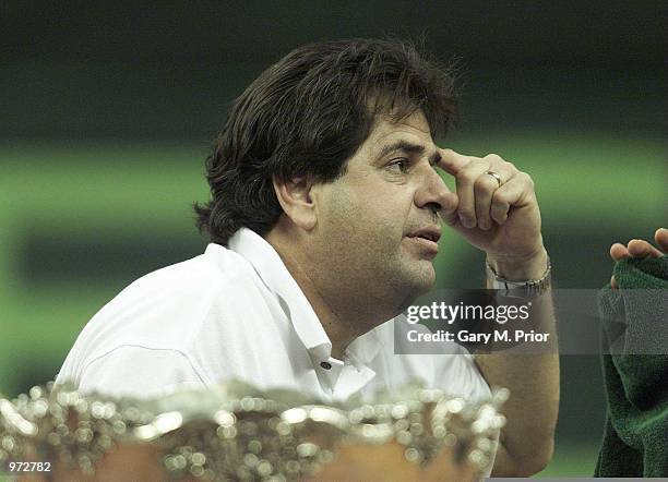 Spanish captain, Javier Duarte talks to Albert Costa during the first rubberbetween Albert Costa of Spain and Lleyton Hewitt of Australia at The...