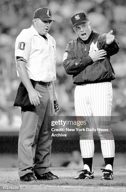 New York Yankee manager Buck Showalter argues a safe call on Texas Rangers' Otis Nixon in the 8th inning after Yankee Don Mattingly made a diving...