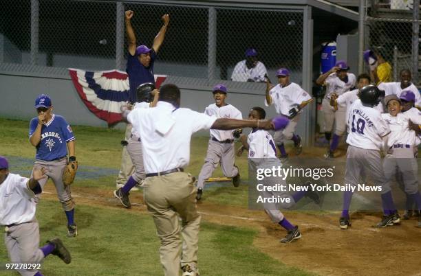 The Harlem Little League team erupts with joy after coming back from a 4-0 deficit to beat Bethlehem, Pa., in extra innings at the 16th annual Little...