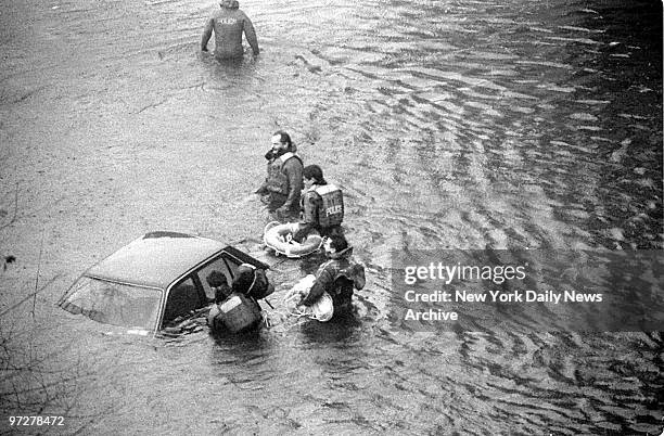 Scuba team goes to the rescue of motorists in flooded northbound lane of the FDR Drive at 80th St.