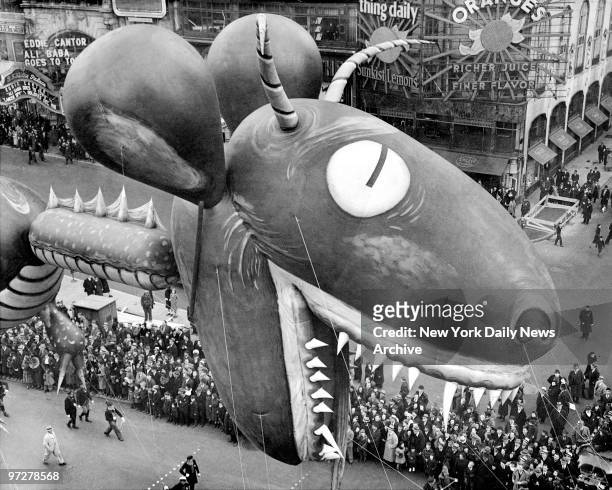 Sea serpent swoops down on crowds watching thirteenth annual Macy's Thanksgiving Day parade on Broadway and 56th St.