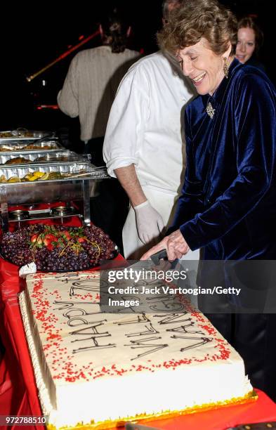 American Jazz music advocate and nightclub owner Lorraine Gordon smiles as she cuts a cake at the 70th anniversary party of her club, the Village...