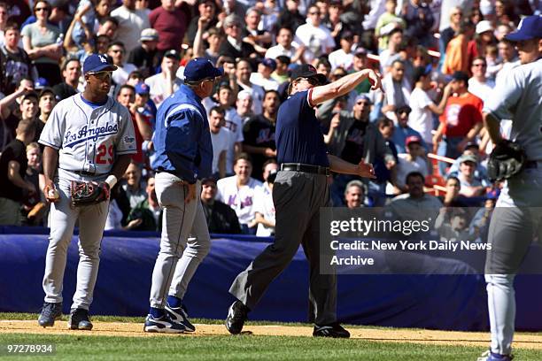 Los Angeles Dodgers' manager Davey Johnson is ejected from game after disputing call that New York Mets' Melvin Mora was safe at third base. The Mets...