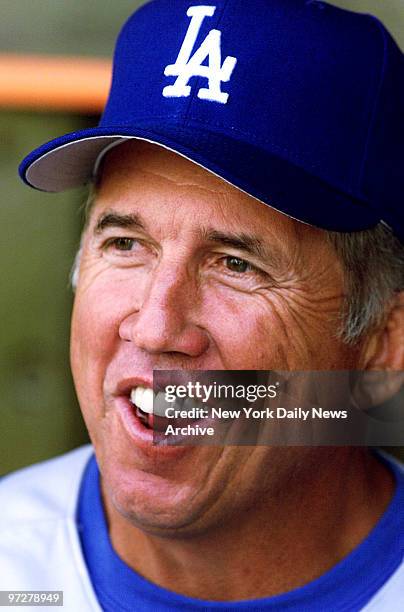 Los Angeles Dodgers' manager Davey Johnson smiles before a spring training game between the Dodgers and the New York Mets.