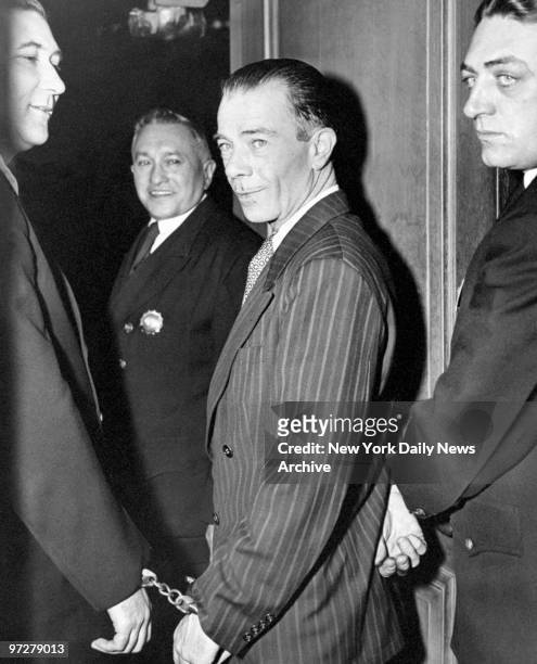 Court attendants Harry Feinberg, William Power and Martin Kaye escort Willie Sutton to be sentenced by Judge Louis Goldstein on gun charges.