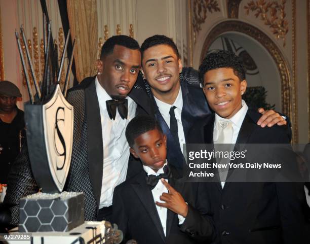 Sean Combs gathers with his sons for his 40th birthday celebration in the historic Grand Ballroom of the Plaza Hotel on Thursday night. A screening...