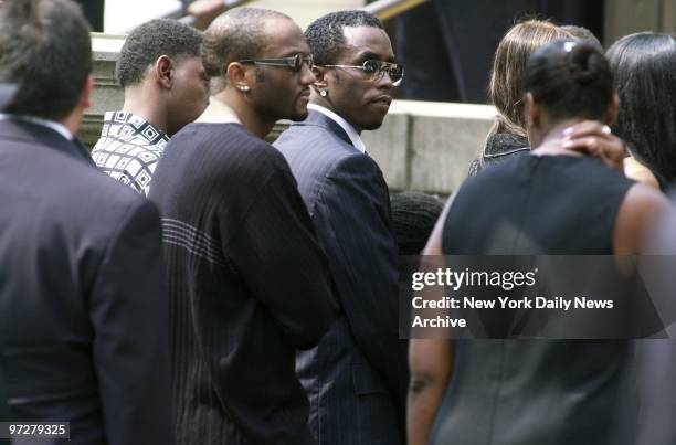 Sean Combs leaves St. Ignatius Loyola Roman Catholic Church on E. 84th St. After attending funeral service for R&B star Aaliyah. The 22-year-old...