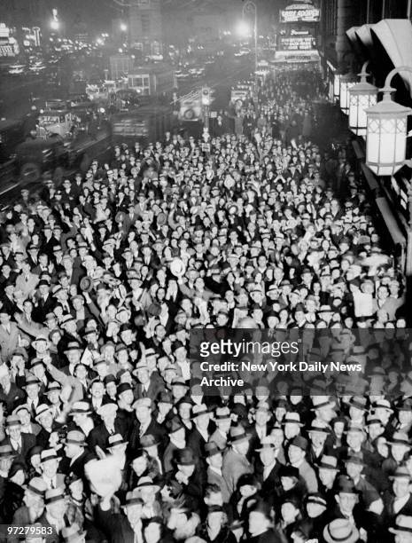 Crowd fills Times Square to celebrate the repeal of the Eighteenth Amendment, ending Prohibition in the United States, December 5th, 1933.