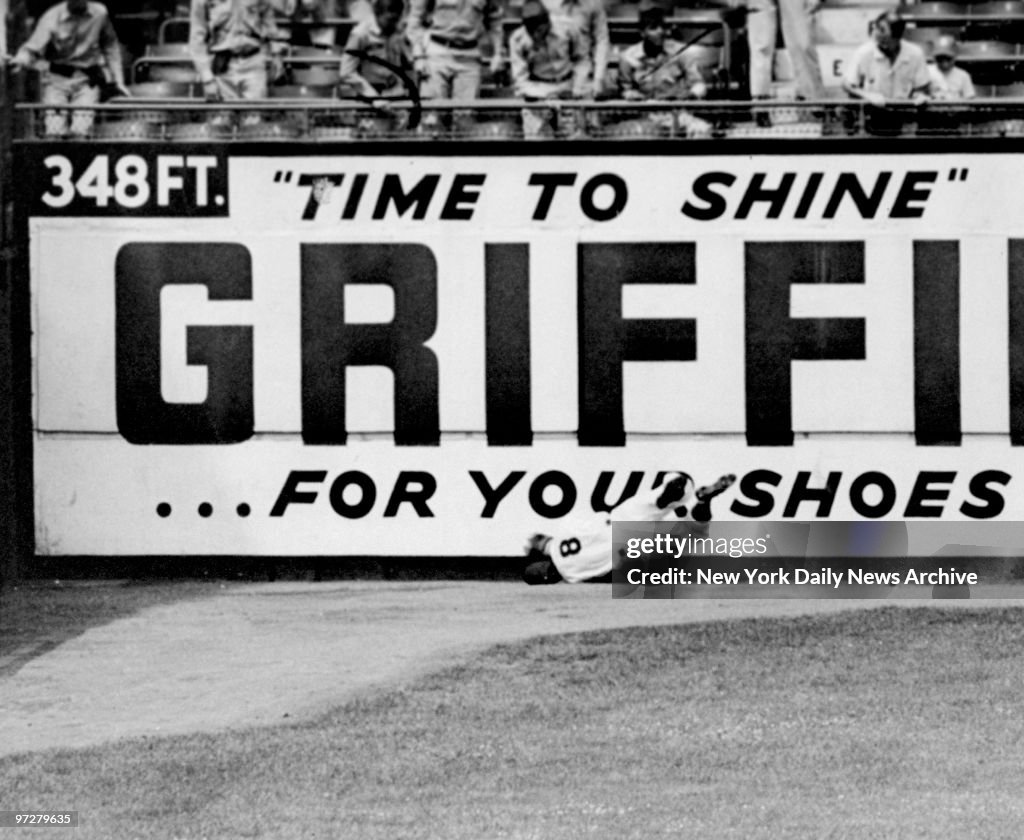 Brooklyn Dodgers' outfielder George Shuba dives for the catc