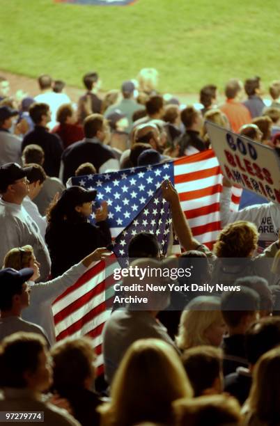 New York Yankees against the Seattle Mariners at Yankee Stadium During the American League Championship Series ALCS. Game 3. 4th edit. Fans with...