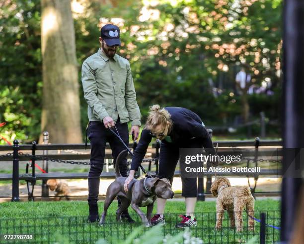 Justin Theroux is seen walking his new adopted rescue pit bull Kuma on June 12, 2018 in New York City.