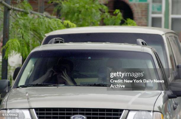 The law is in attendance at the wake of mob boss John Gotti, observing proceedings from a car parked outside the Papavero Funeral Home in Maspeth,...