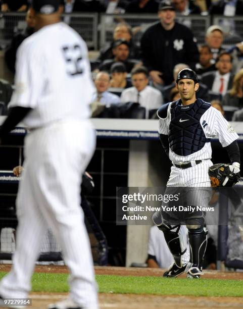 New York Yankees against the Minnesota Twins in Game 1 of the American League Division Series at Yankee Stadlium. Jorge Posada looks at CC Sabathia...