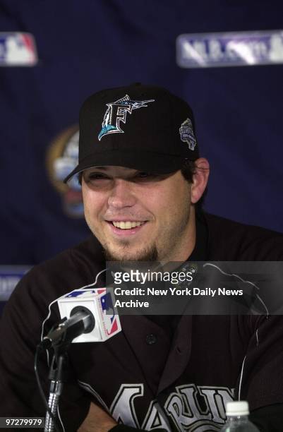Florida Marlins' pitcher Josh Beckett grins during a news conference at Yankee Stadium a day before starting against the New York Yankees in Game 6...