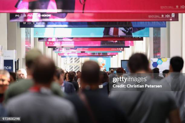 Game enthusiasts and industry personnel attend the Electronic Entertainment Expo E3 at the Los Angeles Convention Center on June 12, 2018 in Los...