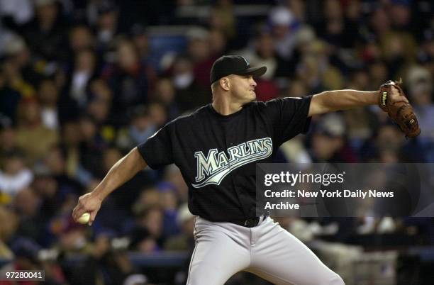 Florida Marlins' Rich Helling delivers a pitch against the New York Yankees in the fourth inning of Game 2 of the World Series at Yankee Stadium. The...