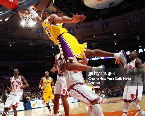 Los Angeles Lakers' Kobe Bryant drives to the basket during the second half of a game against the New York Knicks at Madison Square Garden. Bryant...