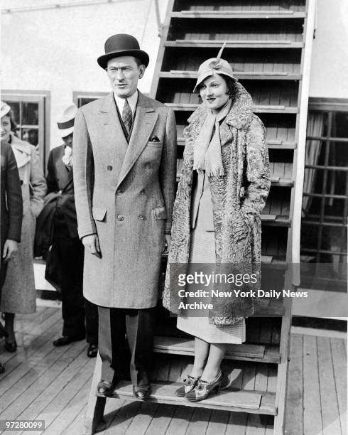 James Walker, former Mayor of New York and his wife, the former Betty Compton, aboard the liner Manhattan as they returned to New York, Oct. 31,...