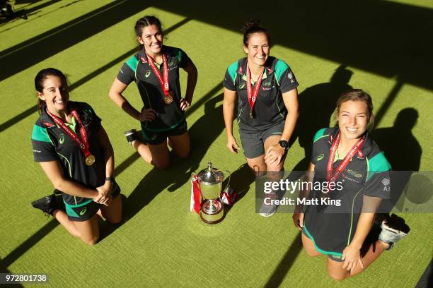Alicia Quirk, Charlotte Caslick, Shannon Parry and Emma Tonegato of the Australian Women's Sevens team pose following their 2017-2018 Sevens World...