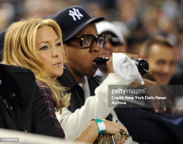 New York Yankees against the Minnesota Twins. Kate Hudson, sitting next to hip-hop mogul Jay-Z, was at the Stadium for Game 1 of Yankees-Twins...