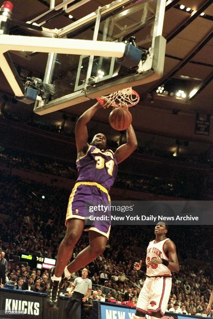 Los Angeles Lakers' Shaquille O'Neal goes up for a slam dunk